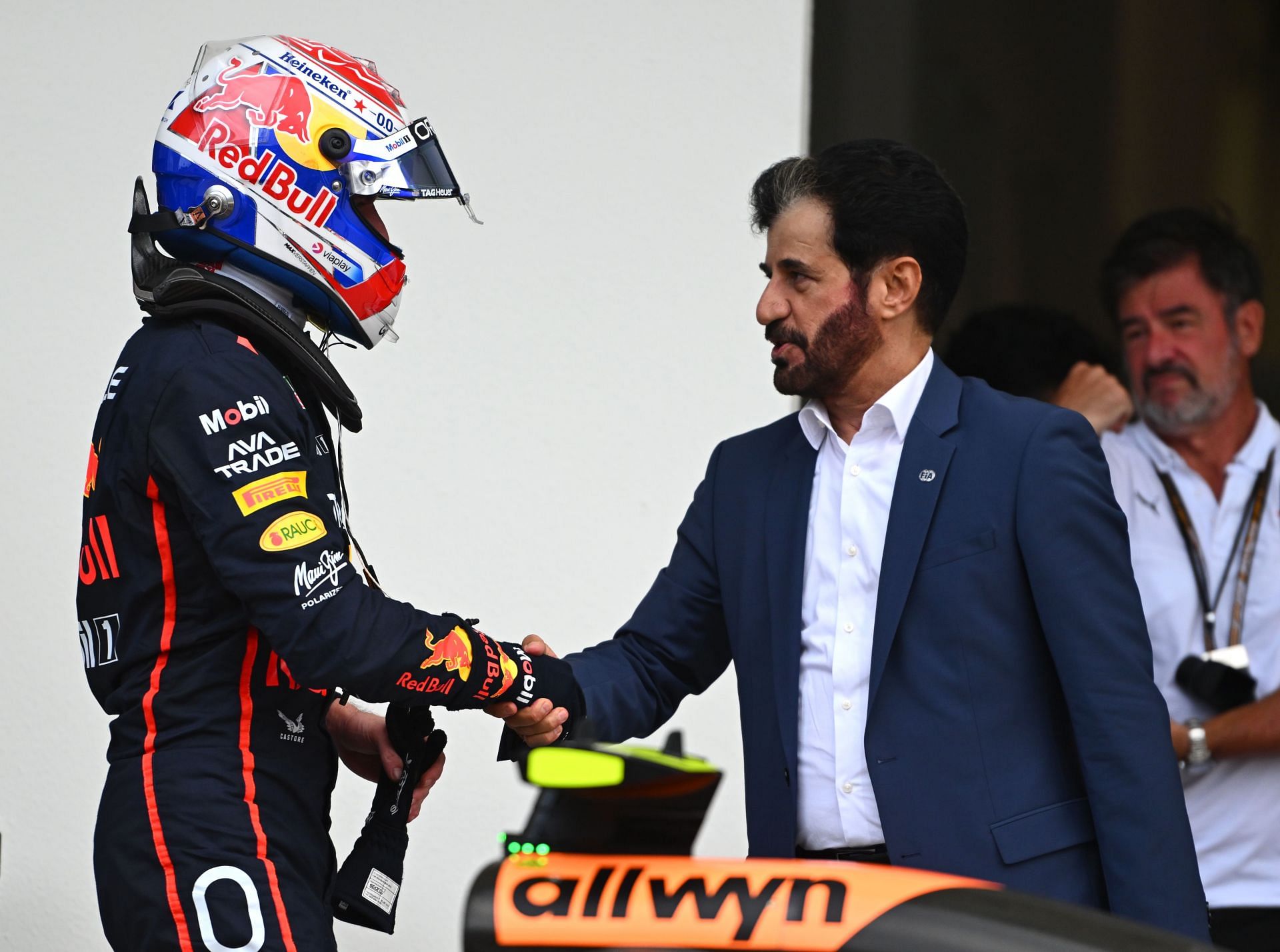 Pole position qualifier Max Verstappen of the Netherlands and Oracle Red Bull Racing is congratulated by Mohammed ben Sulayem, FIA President - Source: Getty